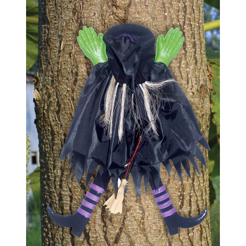 Tree Trunk Witch. Outdoor Decoration.