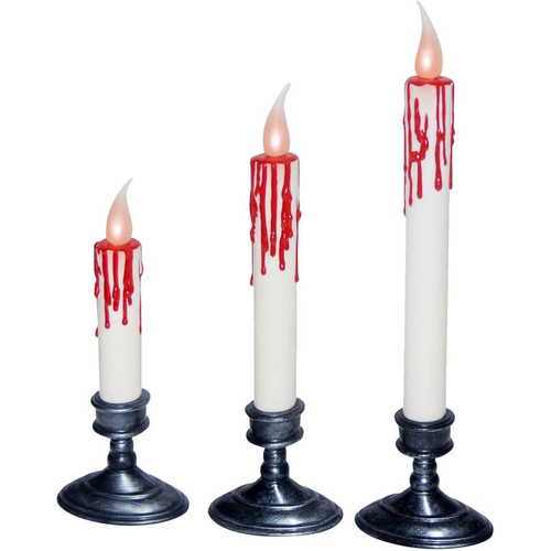 White Candles Dripping Blood. Halloween Table Decoration.